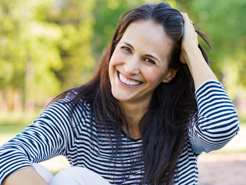 Women are showing the process of hair transplant procedure in the Greater Edmonton Area