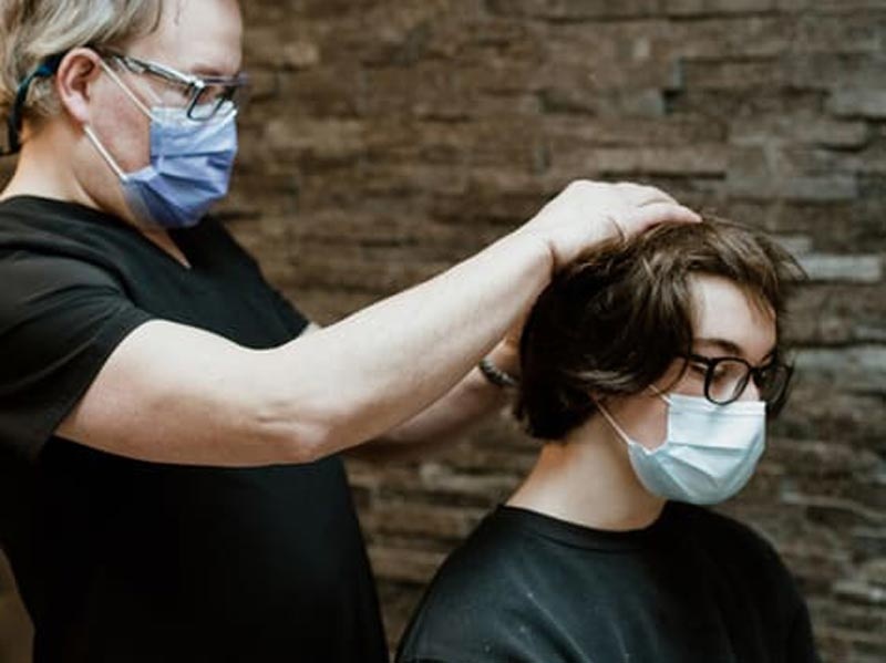 Dr. Vance Elliott treating a patient at Advanced Hair and Skin Surgery in the Greater Edmonton Area